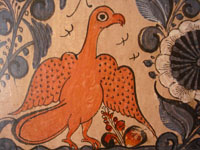 Closeup photo of Tlaquepaque tile with eagle