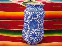 Mexican vintage pottery and ceramics, a Talavera vase from Puebla, c. 1940. Beautiful blue designs of the double-headed Hapsburg eagle, a wonderful plant with a flower, and a beautiful pomegranate (granada). Another side of vase.