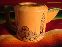 Mexican vintage pottery and ceramics, a teapot and creamer set from Tlaquepaque, c. 1930-40. Closeup photo from the creamer.