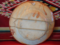 Mexican vintage pottery and ceramics, a bandera-ware charger with a wonderful bull, Tonala or Tlaquepaque, Jalisco, c. 1930's. The charger is decorated with the colors of the Mexican flag (bandera, in Spanish), white, green, and red. Photo of the back side of the charger.