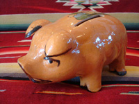 Mexican vintage pottery and ceramics and Mexican vintage folk art, a pottery piggy bank with lovely artwork on its back, from Tlaquepaque, Jalisco, c. 1930's. This is a great piece of Mexican vintage folk art and a collector's dream. Main photo of the pottery piggy bank.