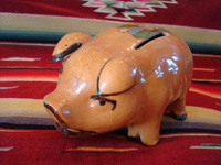 Mexican vintage pottery and ceramics and Mexican vintage folk art, a pottery piggy bank with lovely artwork on its back, from Tlaquepaque, Jalisco, c. 1930's. This is a great piece of Mexican vintage folk art and a collector's dream. Another angle of the bank.