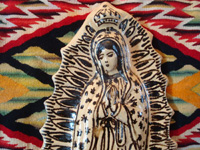 Mexican pottery and ceramics, and Mexican devotional art, a very lovely image of Our Lady of Guadalupe, done in the traditional style and colors of Tzintzuntzan, Michoacan, c. 1990's. Closeup photo of Our Lady's face.