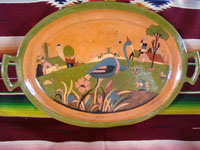 Mexican vintage pottery and ceramics, a pottery oval charger with very fine and detailed artwork, Tonala or Tlaquepaque, Jalisco, c. 1930's.  Main photo of the oval charger or bowl.