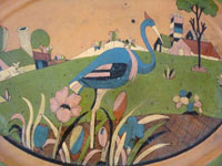 Mexican vintage pottery and ceramics, a pottery oval charger with very fine and detailed artwork, Tonala or Tlaquepaque, Jalisco, c. 1930's.  Closeup photo of the scene on the front of the oval platter.