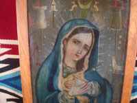 Mexican vintage devotional art, and Mexican vintage tinwork art, a lovely retablo painted on tin, depicting the Dolorosa (Sorrowful Mother), c. 1930. Closeup photo of our Lady's face.
