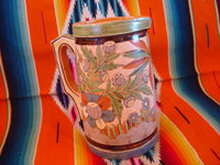 Mexican vintage pottery and ceramics, a beautiful petatillo (cross-hatching in the background, resembling a straw mat or petate, in Spanish) pottery pitcher, with beautiful and intricate decorations, Tonala or San Pedro Tlaquepaque, c. 1930's. Main photo of one side of the pitcher.