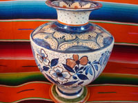 Mexican vintage pottery and ceramics, a spectacular pottery vase or urn with a cream-colored background, fantastic artwork, and covered with tiny stars, Tonala or San Pedro Tlaquepaque, c. 1920-30's.  Side view of another part of the vase.