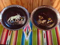 Mexican vintage pottery and ceramics, a beautiful pair of blackware plates with wonderful artwork, Tonala or San Pedro Tlaquepaque, c. 1930's.  Main photo of the pair of plates.