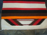 Native American Indian vintage textiles and rugs, and Navajo vintage textiles and rugs, a lovely Navajo double saddle-blanket, with wonderful colors and a very fine weave, Arizona or New Mexico, c. 1950's.  A photo showing one end of the Navajo textile.