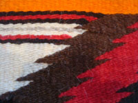 Native American Indian vintage textiles and rugs, and Navajo vintage textiles and rugs, a lovely Navajo double saddle-blanket, with wonderful colors and a very fine weave, Arizona or New Mexico, c. 1950's.  Closeup photo of a part of the textile, showing the very fine weave.