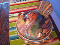 Mexican vintage pottery and ceramics, a wonderful pottery lidded casserole in the form of a nesting turkey, beautifully glazed and with wonderful colors, Tonala or San Pedro Tlaquepaque, Jalisco, c. 1940's. Photo shot from above the turkey, looking down.