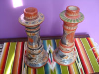 Mexican vintage pottery and ceramics, a pair of burnished pottery candleholders beautifully decorated with patterns of vines, Tonala, Jalisco, c. 1950's. Main photo of the paiirl
