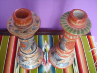 Mexican vintage pottery and ceramics, a pair of burnished pottery candleholders beautifully decorated with patterns of vines, Tonala, Jalisco, c. 1950's. Another frontal view of the pair.