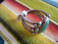 Native American Indian sterling silver jewelry, and Navajo sterling silver jewelry, a beautiful Navajo sterling silver ring with a lovely turquoise stone, Arizona or New Mexico, c.1940's. A side view of the ring.