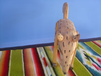 Mexican vintage folk art, a wonderful woodcarving of a squirrel with a bushy tail, attributed to the great folk artist Manuel Jimenez of Oaxaca, c. 1950's. Photo of the front of the squirrel showing its face.