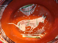 Mexican vintage pottery and ceramics, a lovely banderaware charger with beautiful artwork featuring a figural animal, Tonala or San Pedro Tlaquepaque, c. 1930's. Closeup photo of the animal on the front.
