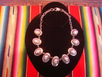 Mexican vintage sterling silver jewelry, and Taxco vintage sterling silver jewelry, a beautiful Taxco silver necklace with lovely half spheres with a braided bezel, laid on silver petals, Taxco, c. 1940's.  Main photo of the necklace.