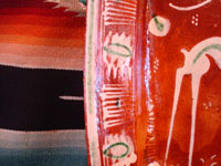 Mexican vintage pottery and ceramics, a lovely oval dish, bandera-ware (the colors of the Mexican flag or bandera), decorated with a graceful deer and cypress tree, Tlaquepaque, c. 1930-40's. A closeup photo of the border around the front of the plate.
