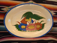 Mexican vintage pottery and ceramics, a beautiful oval platter decorated with a very lovely bird and flowers, Talquepaque, Jalisco, c. 1930-40's. Main photo of the front of the oval platter.