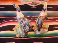 Mexican or Guatemalan vintage pottery and ceramics, a lovely pair of birds, very finely crafted and each with a round fruit in its mouth, Mexico or Guatemala, c. 1930's. Photo of the back side of the figures.