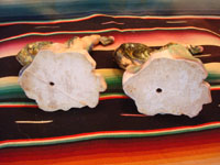 Mexican or Guatemalan vintage pottery and ceramics, a lovely pair of birds, very finely crafted and each with a round fruit in its mouth, Mexico or Guatemala, c. 1930's. Photo of the bottom sides of the two figures.