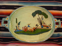 Mexican vintage pottery and ceramics, a spectacular oval tray or charger with handles, a wonderful pale-green background glaze, and very fine artwork, Tlaquepaque, Jalisco, c. 1930's. Main photo of the tray.
