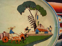 Mexican vintage pottery and ceramics, a spectacular oval tray or charger with handles, a wonderful pale-green background glaze, and very fine artwork, Tlaquepaque, Jalisco, c. 1930's. Photo showing the house under trees.