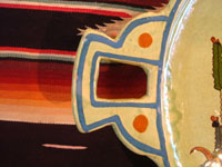Mexican vintage pottery and ceramics, a spectacular oval tray or charger with handles, a wonderful pale-green background glaze, and very fine artwork, Tlaquepaque, Jalisco, c. 1930's. Closeup photo of one handle of the tray.