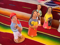 UU-3: Mexican vintage folk-art, and Mexican vintage pottery and ceramics, a wonderful and whimsical wedding scene filled with beautifully crafted pottery figures, by the very famous folk-artist, Josephina Aguilar of Acatlan, Oaxaca, c. 1960's. Photo of the wedding guests.
