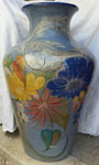 Mexican vintage pottery and ceramics, one of a pair of giant, beautiful burnished vases, Tonala, Jalisco, c. 1930-40's. One vase has a unique salmon-colored background and fantastic exotic bird. The second vase has a lovely blue background, and exotic bird, and wonderful floral designs.