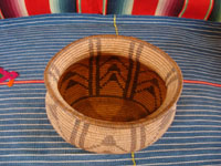 Native American Indian baskets, a very wonderful and rare Chemehuevi basket with an unusual oblong shape and a beautiful geometric pattern of decoration, from near Parker, Arizona, along the Colorado river, c. 1900.  Photo shot from above the Chemehuevi basket, looking down.