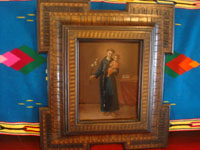 Mexican colonial art, and Mexican tinwork art and retablos, a stunning retablo depicting Saint Anthony and the Child Jesus, painted on copper and in a handmade wooden frame, Mexico, c. 18th-early 19th century. Main photo of the retablo on copper.