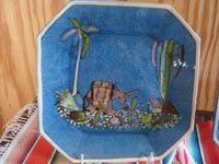 Mexican vintage pottery and ceramics, a pair of octagonal pottery plates with a lovely blue glazed background and wonderful artwork, Tonala or San Pedro Tlaquepaque, c. 1930's. Closeup photo of the first plate.