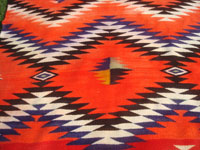 Native American Indian vintage textiles, and Navajo vintage textiles and rugs, a stunning Navajo transitional textile, Arizona or New Mexico, c. 1890-1900.  Closeup photo of the center of the Navajo textile.