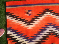 Native American Indian vintage textiles, and Navajo vintage textiles and rugs, a stunning Navajo transitional textile, Arizona or New Mexico, c. 1890-1900.  Closeup photo of one edge of the textile.