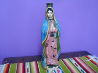 Mexican vintage folk art, a pottery bottle representing Our Lady of Guadalupe, Tonala or San Pedro Tlaquepaque, c. 1930's. Main photo of the bottle.