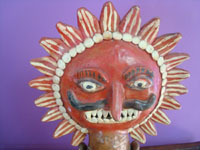 Mexican vintage folk art, a pottery sculpture depicting the sun, attributed to the great Candelario Medrano, Santa Cruz de las Huertas, Jalisco, c. 1950. Closeup photo of the face of the sun.