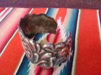 Mexican vintage sterling silver jewelry, and Taxco vintage silver jewelry, a beautiful repousse Taxco silver bracelet with incredible silverwork and beautiful designs, Taxco, c. 1940's.  Side view of the bracelet showing the fine floral silverwork.