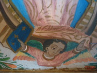 Mexican vintage devotional art, a wonderful retablo depicting Our Lady of Guadalupe, painted on tin, Mexico, c. 1930's. Closeup photo of the angel at the base of the retablo.