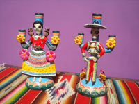 Mexican vintage folk art, a wonderful pair of pottery Day of the Dead candleholders by the famous late artist Alfonso Castillo, c. 1980. Main photo of the candleholders.