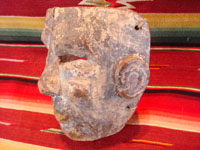 Mexican vintage wood-carving and vintage folk art, a carved wooden mask from Puebla, 1930 or earlier. The mask is from the Danza de Abonicos (Dance of the Fans), and originates from Huauchinango, in the state of Puebla. Side view of the Puebla mask.