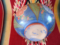 Mexican vintage pottery and ceramics, a wonderful burnished jar from Tonala, c. 1930's. The burnished jar is decorated with beautiful flowers, and has a wonderful blue background. Photo showing the bottom of the Tonala burnished jar.