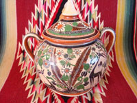Mexican vintage pottery and ceramics, a lovely petatillo (background with straw-like hatchwork design) lidded jar, signed by the artist Jose Bernabe, on the bottom, c. 1960's. View of the second side of the Tonala jar.
