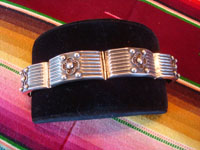 Mexican vintage sterling silver jewelry, and Taxco vintage silver jewelry, a lovely silver bracelet with excellent repousse work (or bump out's), Taxco, c. 1940's. Main photo of the Taxco silver bracelet.