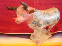 Mexican vintage pottery and ceramics, and vintage Mexican folk art, a wonderful burnished pottery bank in the form of a wonderful bull, with very detailed artwork on both sides, Tonala or Tlaquepaque, c. 1930's. A closeup view of the burnished pottery bull from Tonala or Tlaquepaque.