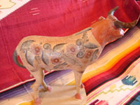 Mexican vintage pottery and ceramics, and vintage Mexican folk art, a wonderful burnished pottery bank in the form of a wonderful bull, with very detailed artwork on both sides, Tonala or Tlaquepaque, c. 1930's. A photo showing the decorations on the second side of the burnished pottery bull from Tonala or Tlaquepaque, Jalisco.