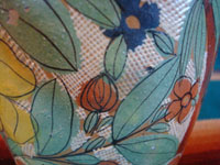 Mexican vintage pottery and ceramics, a lovely petatillo vase, with beautiful hand-painted decorations, Tonala or San Pedro Tlaquepaque, Jalisco, c. 1930's. A closeup photo of some of the artwork on the Tonala vase.
