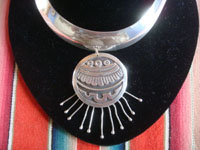 Mexican vintage sterling silver jewelry, and Taxco vintage sterling silver jewelry, a stunning choker-style necklace with a magnificent medallion or pendant, Taxco, c. 1940's. Closeup photo of the pendant or medallion.