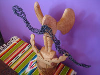 Mexican vintage folk art, a beautiful eagle carved of wood with a hand-twisted wire snake in its mouth and perched on a beaver cactus, the emblem of the nation of Mexico, Oaxaca, 1950's. Main photo of the eagle.